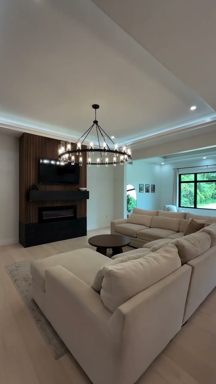 Linear fireplace and walnut slat feature wall in a BS Building Co. custom home